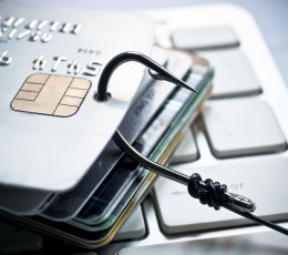 a close up of a credit card on a computer keyboard.